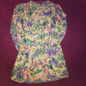 Long sleeve asymmetrical bottom spring dress.